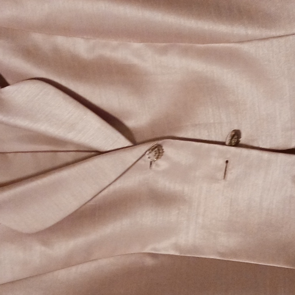 Evening satin looking jacket.  Intricate stones and sequins around double lapel